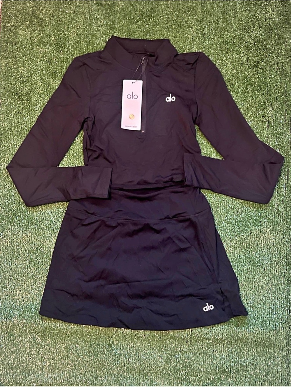 ALO Yoga Black Long-Sleeve 1/4 Zip Cropped Top and Skirt with built-in shorts